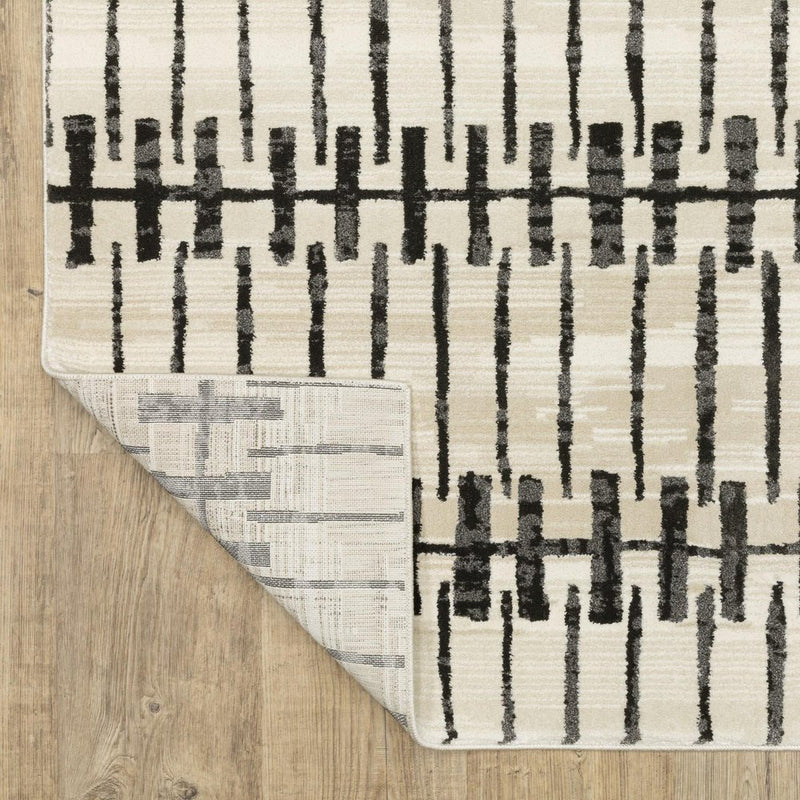 5' X 8' Beige And Black Geometric Area Rug