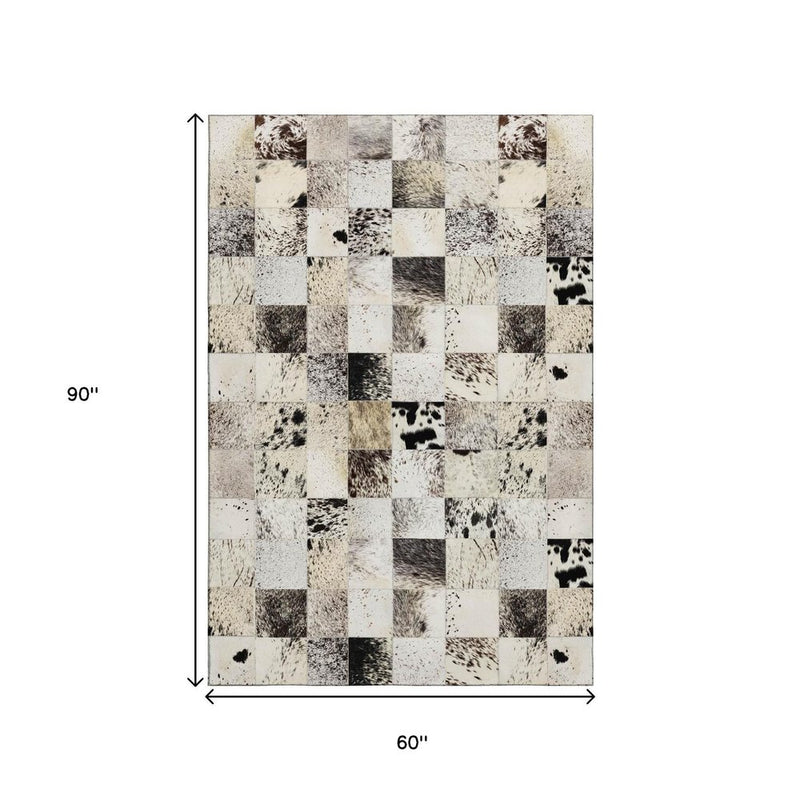 3' X 5' Black Granite Gray And Ivory Cowhide Print Washable Area Rug With UV Protection