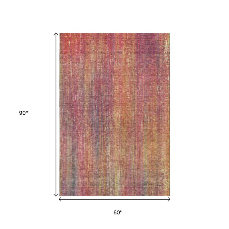 5' X 8' Red Yellow And Orange Striped Washable Area Rug With UV Protection