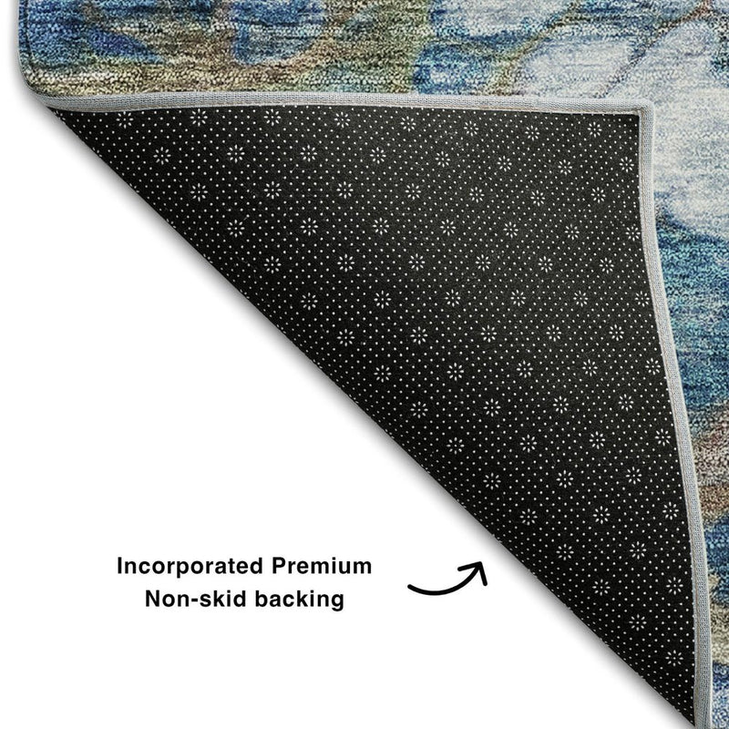 5' X 8' Coral Blue And Ivory Abstract Washable Area Rug With UV Protection