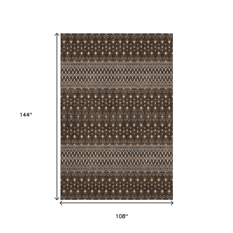 5' X 8' Chocolate And Ivory Tribal Washable Area Rug With UV Protection