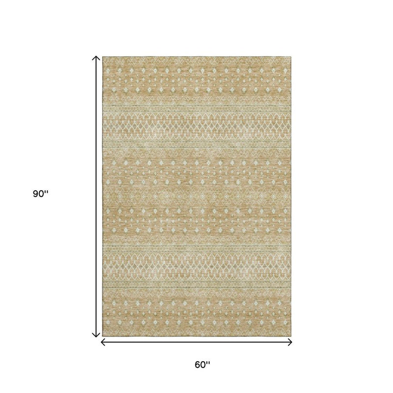 5' X 8' Copper And Ivory Tribal Washable Area Rug With UV Protection