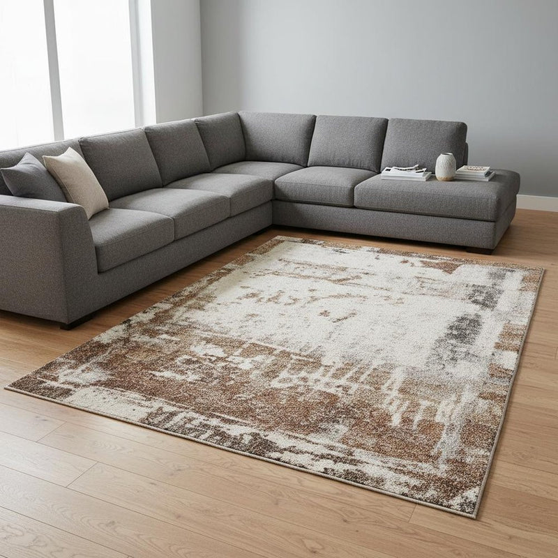 5' X 8' Beige And Brown Abstract Area Rug