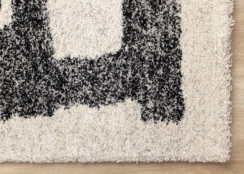 8' X 11' Beige And Black Abstract Area Rug