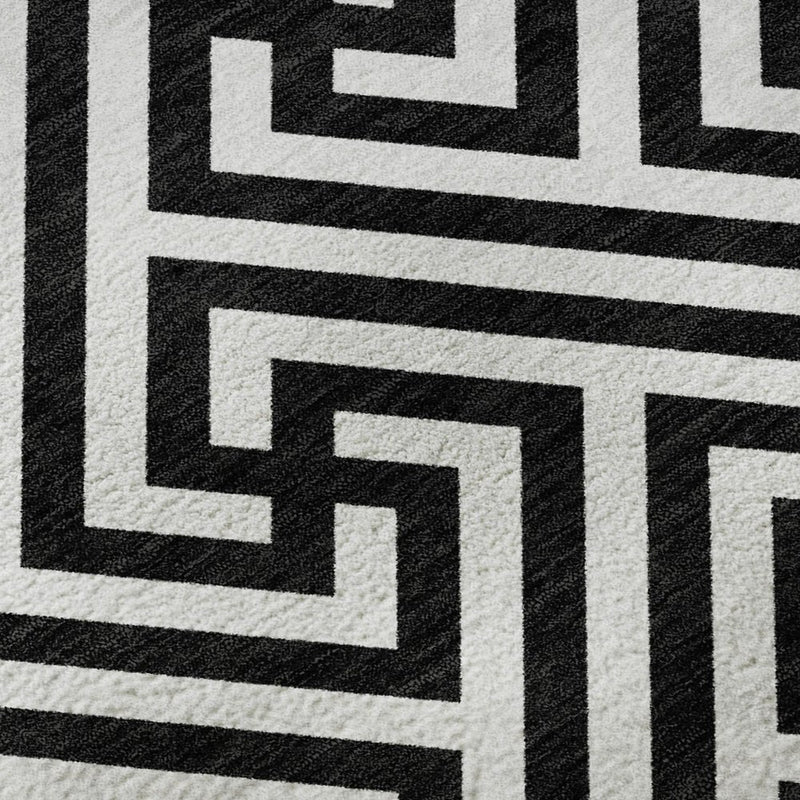 9' X 12' Black And Ivory Geometric Washable Area Rug With UV Protection