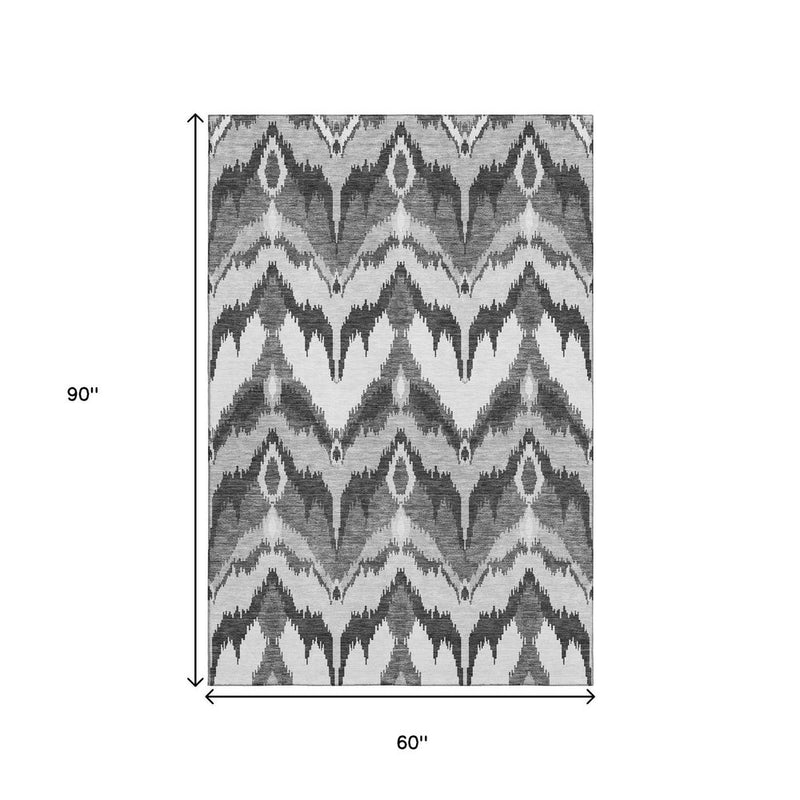 5' X 8' Gray And Silver Ikat Washable Area Rug With UV Protection