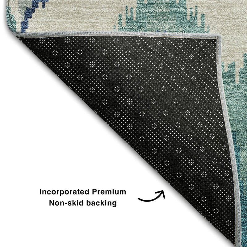 5' X 8' Teal And Ivory Ikat Washable Area Rug With UV Protection