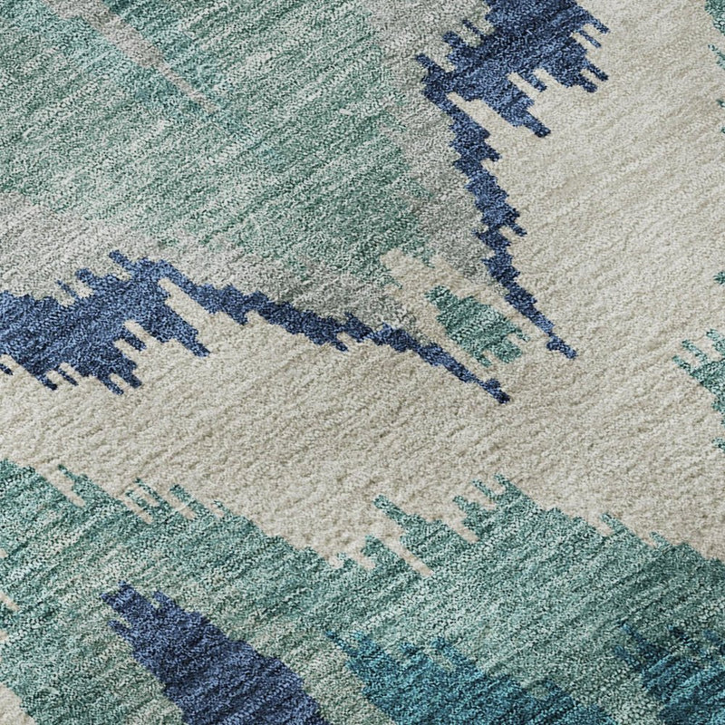5' X 8' Teal And Ivory Ikat Washable Area Rug With UV Protection