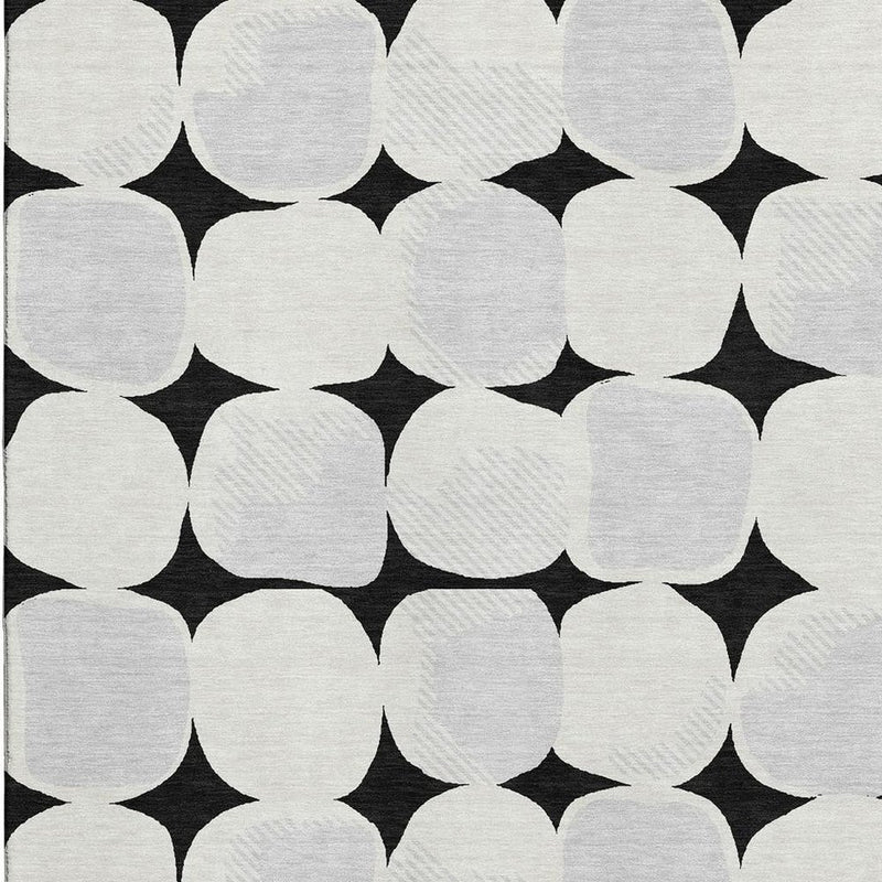 9' X 12' Black And Ivory Abstract Geometric Washable Area Rug With UV Protection