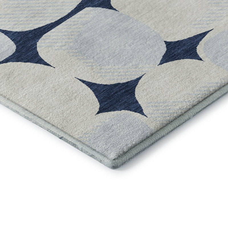 5' X 8' Navy Blue And Ivory Abstract Geometric Washable Area Rug With UV Protection