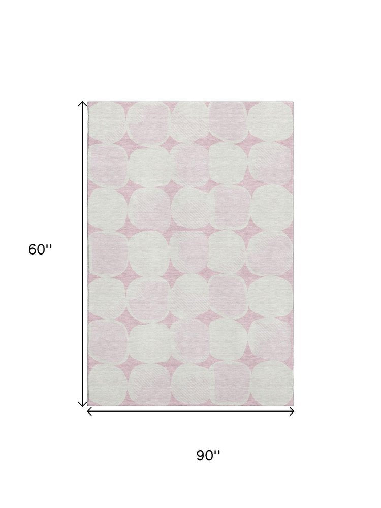 5' X 8' Pink And Ivory Abstract Geometric Washable Area Rug With UV Protection