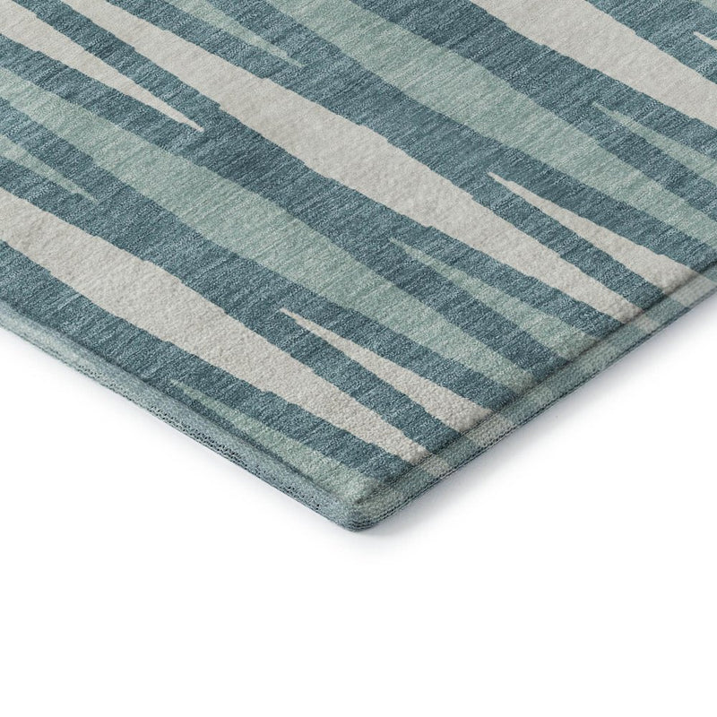 5' X 8' Teal And Ivory Geometric Washable Area Rug With UV Protection