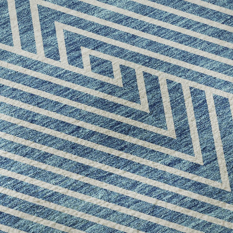 8' X 10' Teal And Ivory Geometric Washable Area Rug With UV Protection