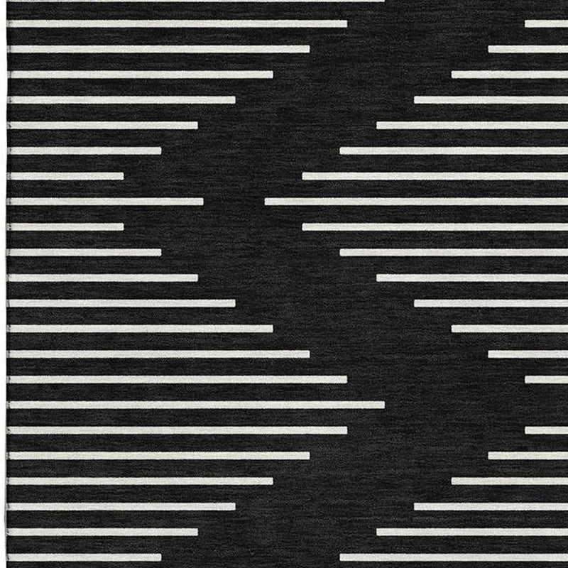 8' X 10' Black And Ivory Geometric Washable Area Rug With UV Protection