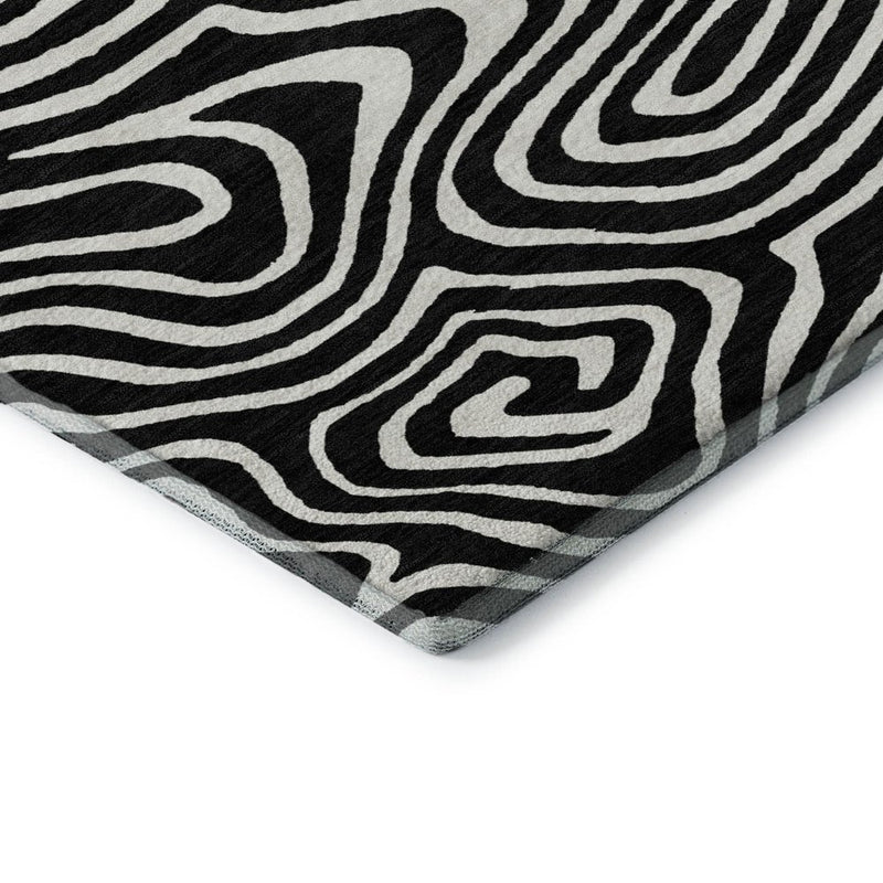 8' X 10' Black And Ivory Abstract Washable Area Rug With UV Protection