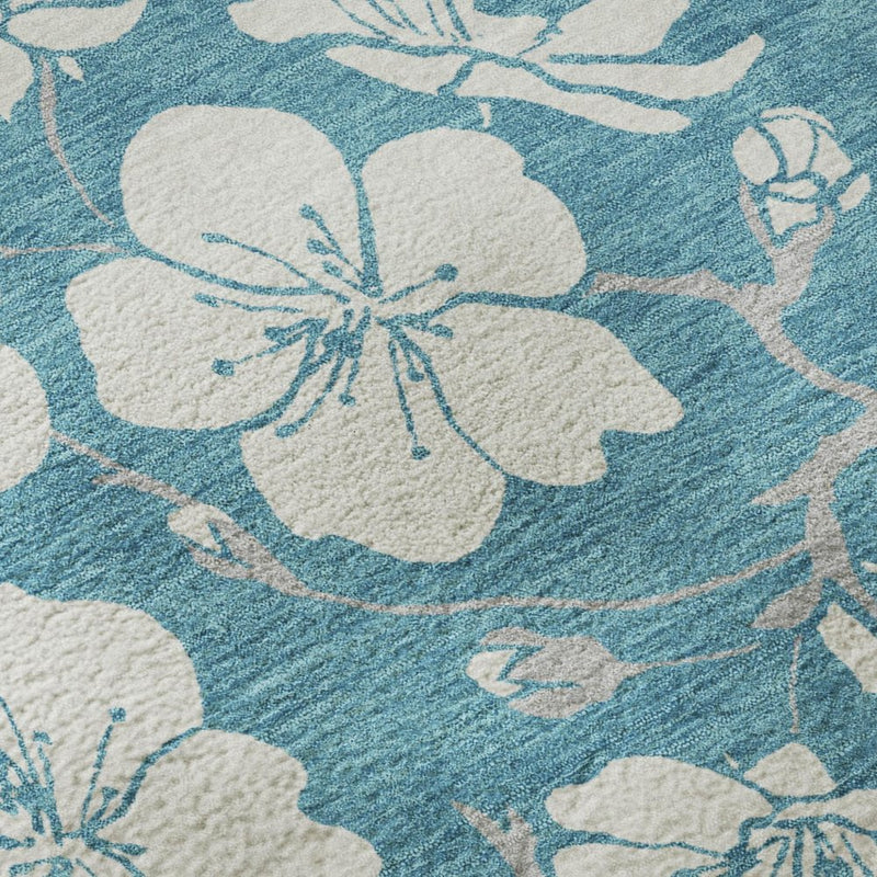 5' X 8' Turquoise And Ivory Floral Washable Area Rug With UV Protection