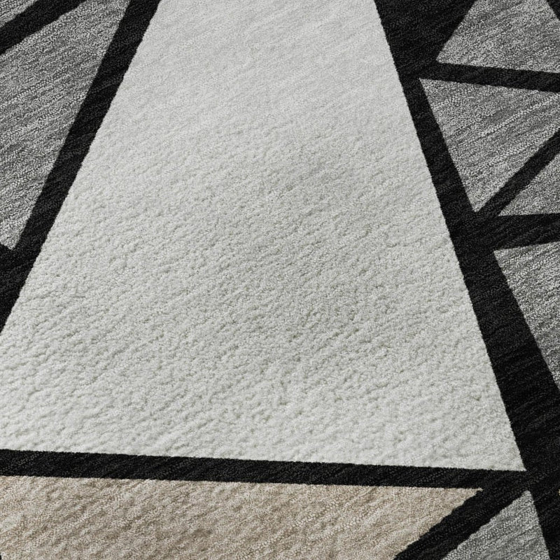 5' X 8' Black Beige And Ivory Geometric Washable Area Rug With UV Protection