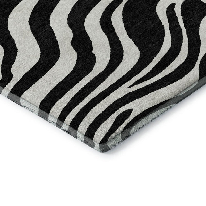8' X 10' Black And Ivory Animal Print Washable Area Rug With UV Protection