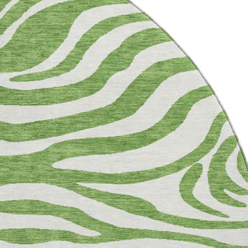 8' Green And Ivory Animal Print Washable Round Rug With UV Protection