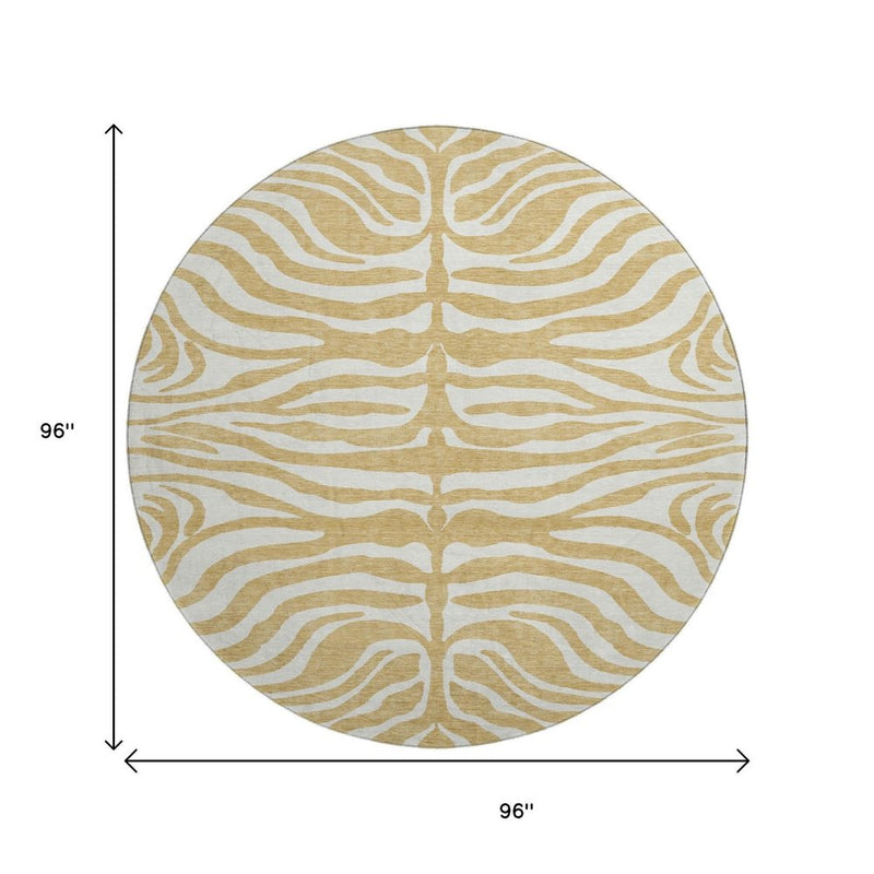 8' Gold And Ivory Animal Print Washable Round Rug With UV Protection