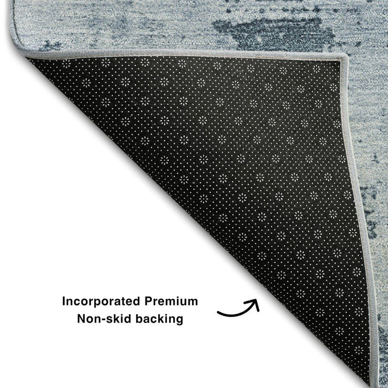 8' X 10' Denim Blue And Ivory Abstract Washable Area Rug With UV Protection