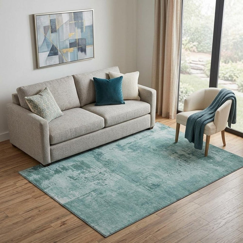 5' X 8' Teal And Aqua Abstract Washable Area Rug With UV Protection