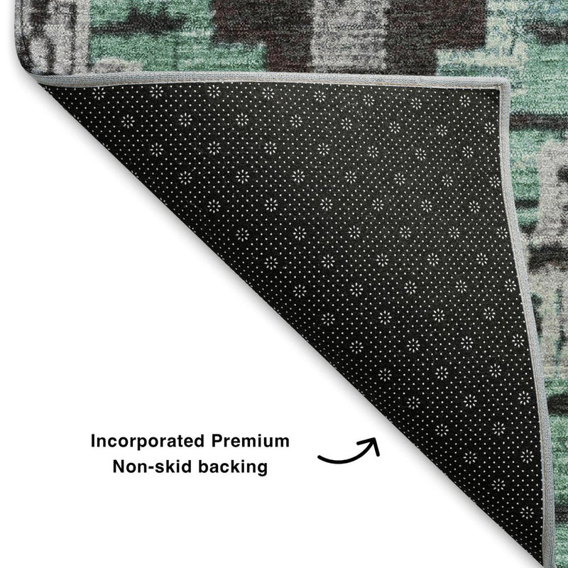 5' X 8' Teal Charcoal And Ivory Ikat Washable Area Rug With UV Protection
