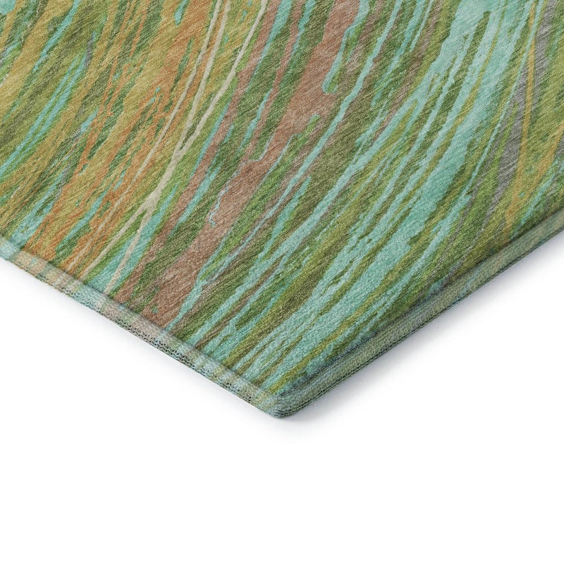 8' Green And Peach Abstract Washable Round Rug With UV Protection