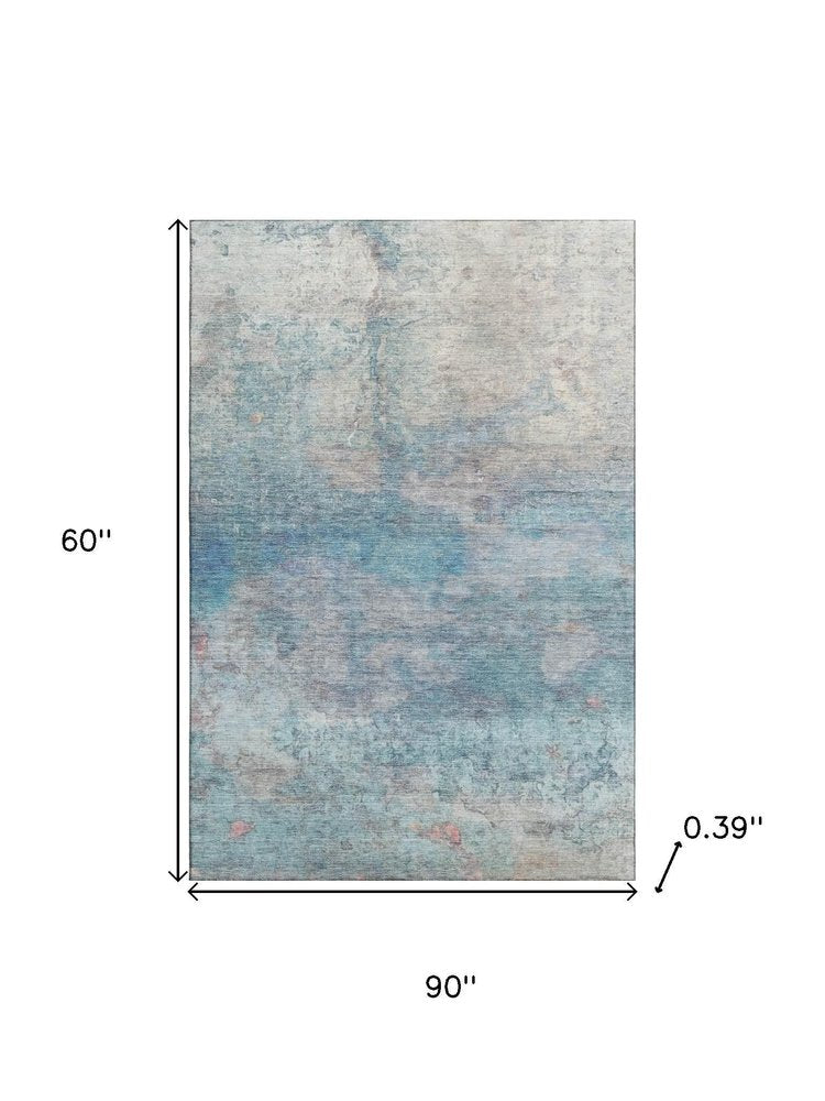 5' X 8' Aqua And Beige Abstract Washable Area Rug With UV Protection