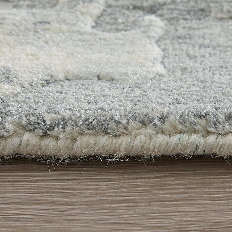 9' X 12' Blue And Ivory Abstract Hand Woven Area Rug