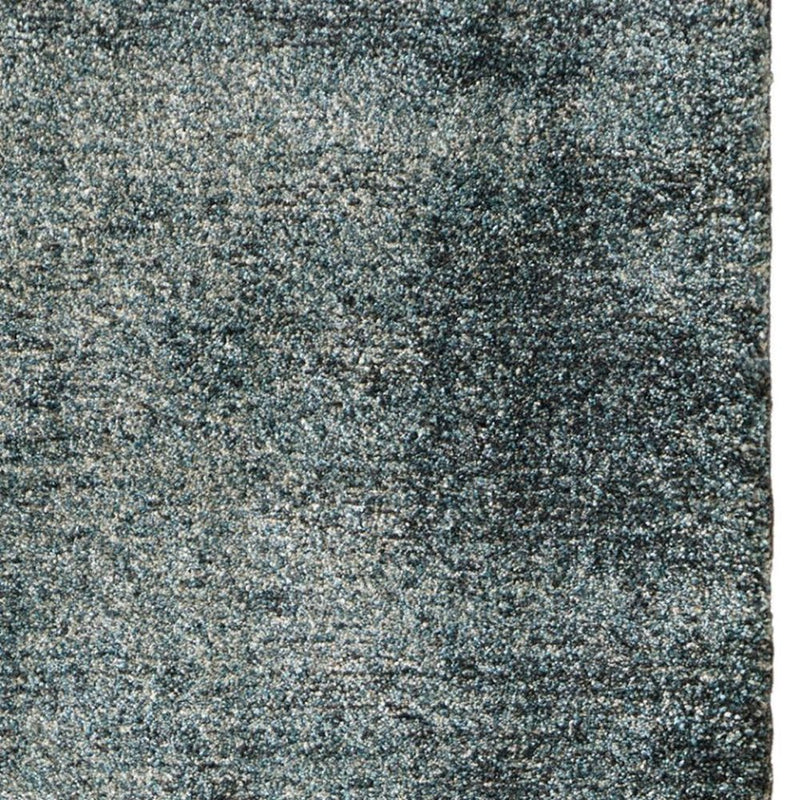 7' Blue And Ivory Abstract Area Rug