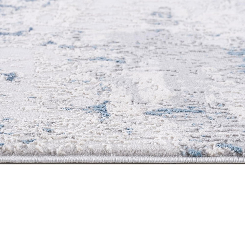 2' X 4' Blue And Cream Abstract Area Rug