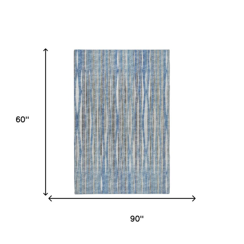 5' X 8' Blue And Ivory Striped Shag Washable Area Rug With UV Protection