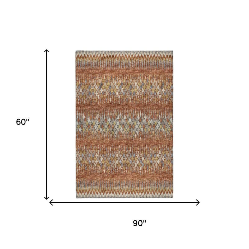 5' X 8' Orange And Blue Chevron Shag Washable Area Rug With UV Protection