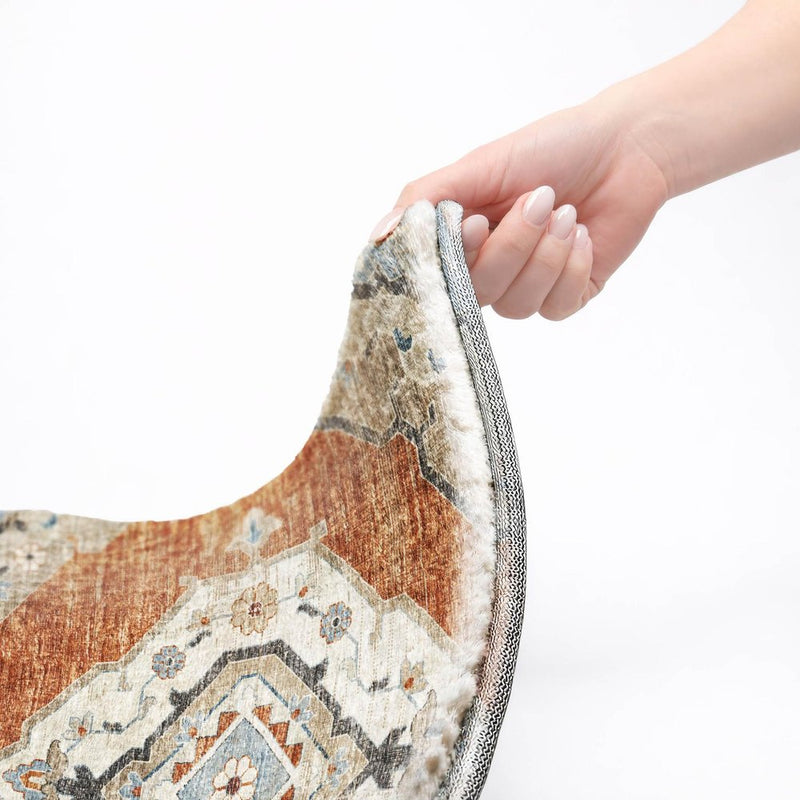 8' Orange And Ivory Oriental Shag Washable Round Rug With UV Protection