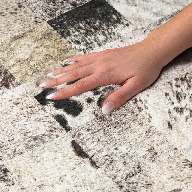 8' Black And Ivory Animal Print Shag Washable Round Rug With UV Protection
