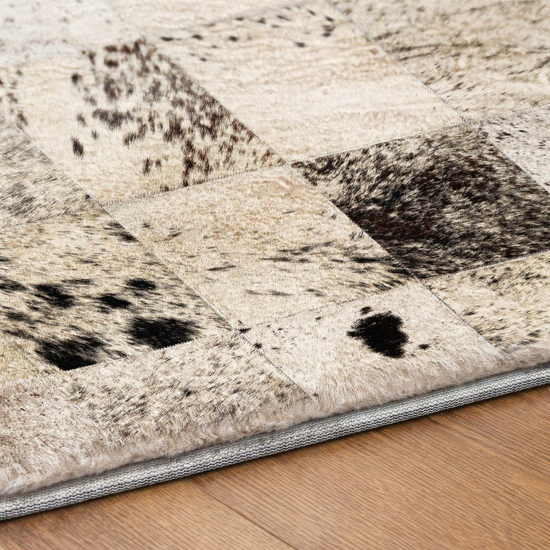 9' X 12' Black And Ivory Animal Print Shag Washable Area Rug With UV Protection