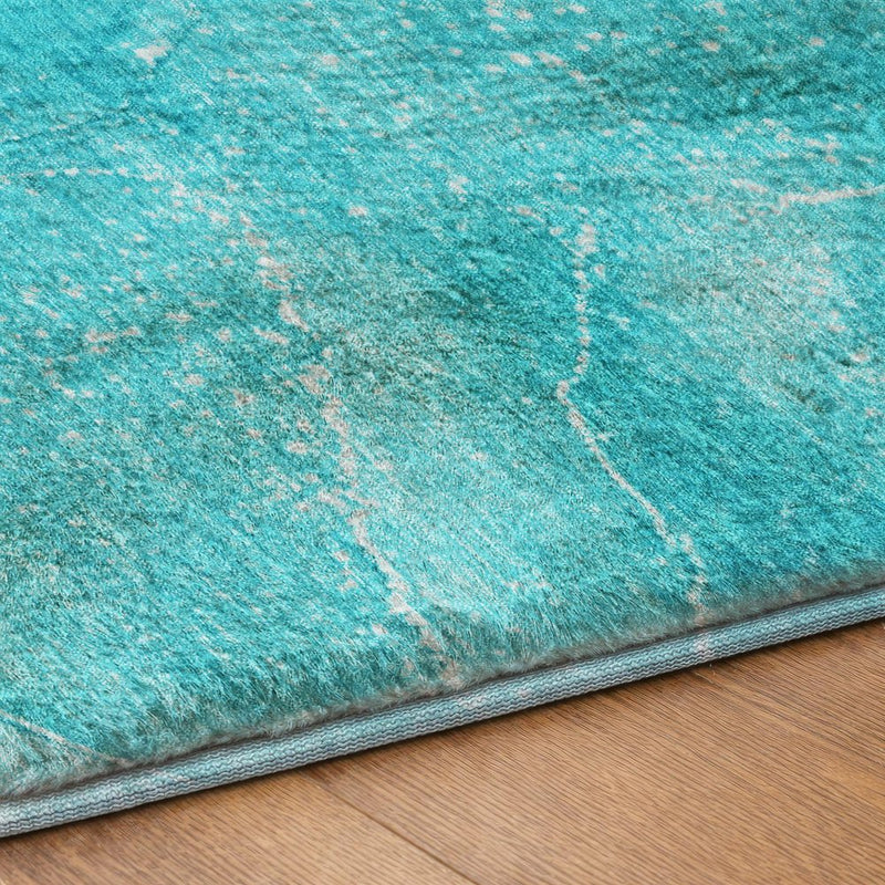 5' X 8' Teal And Ivory Abstract Shag Washable Area Rug With UV Protection