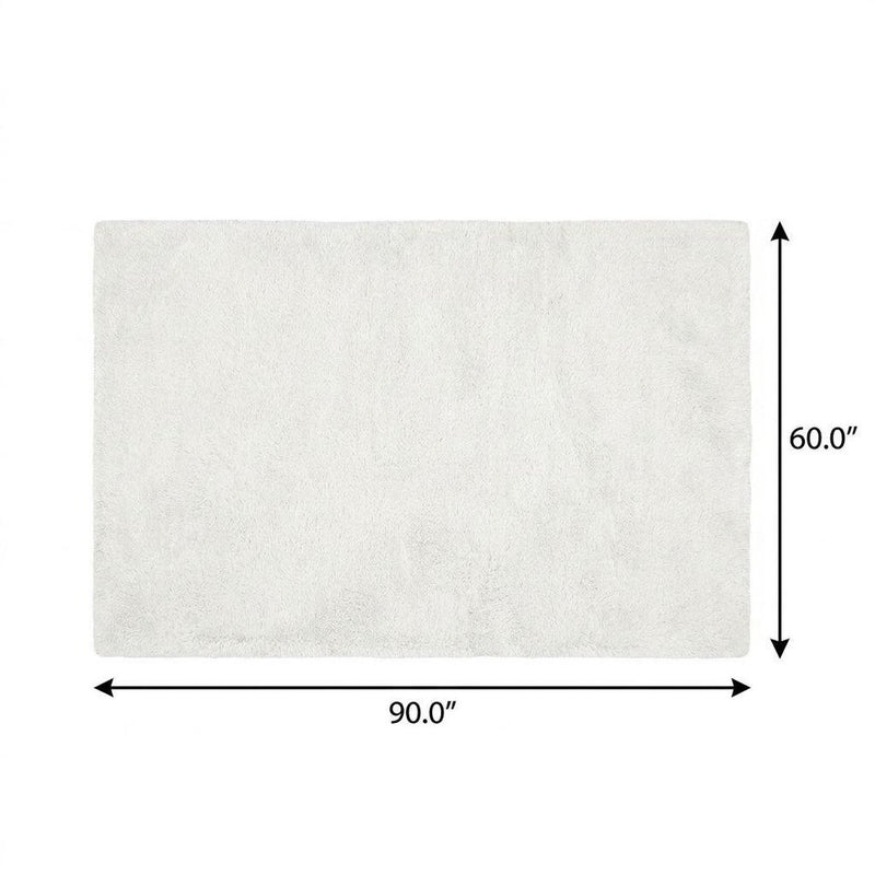 5' X 8' Ivory And Beige Abstract Shag Washable Area Rug With UV Protection