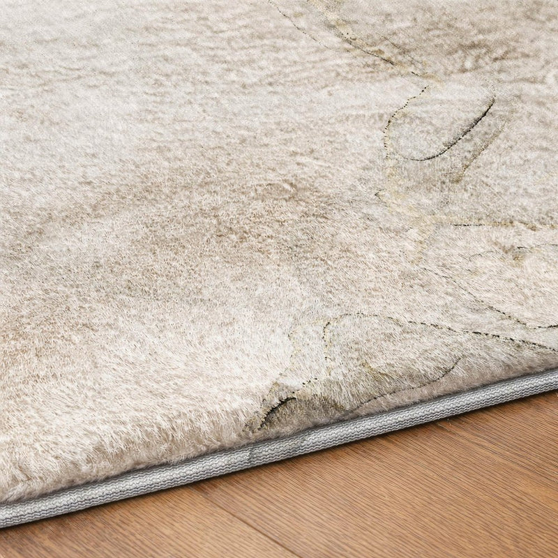 8' Beige And Taupe Abstract Shag Washable Round Rug With UV Protection