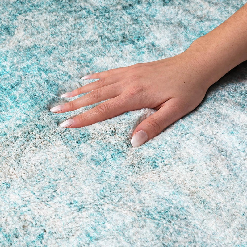 10' X 14' Teal And Ivory Abstract Shag Washable Area Rug With UV Protection