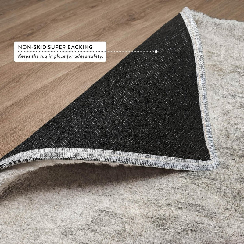 8' Silver And Gray Abstract Shag Washable Round Rug With UV Protection