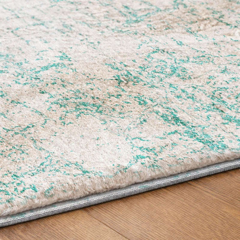 5' X 8' Teal And Ivory Abstract Shag Washable Area Rug With UV Protection
