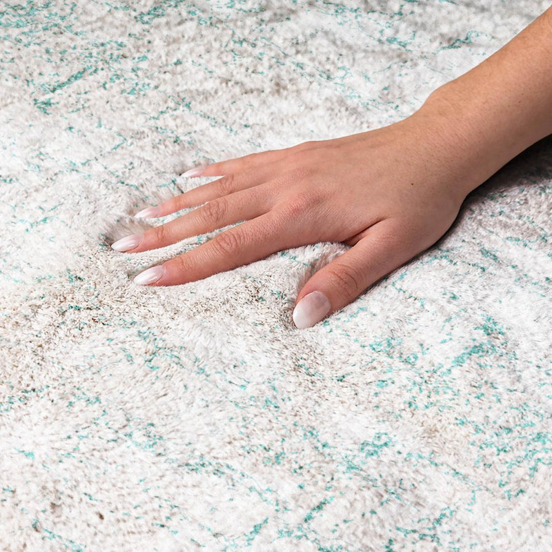 5' X 8' Teal And Ivory Abstract Shag Washable Area Rug With UV Protection
