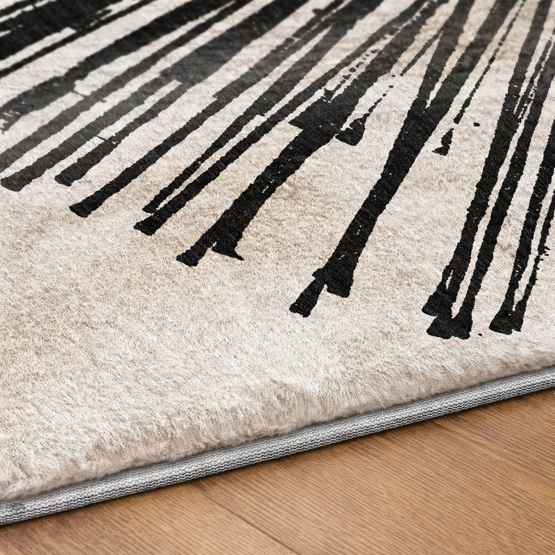 9' X 12' Black And Ivory Abstract Shag Washable Area Rug With UV Protection