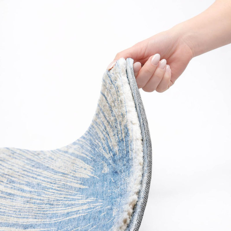 9' X 12' Denim Blue And Ivory Abstract Shag Washable Area Rug With UV Protection