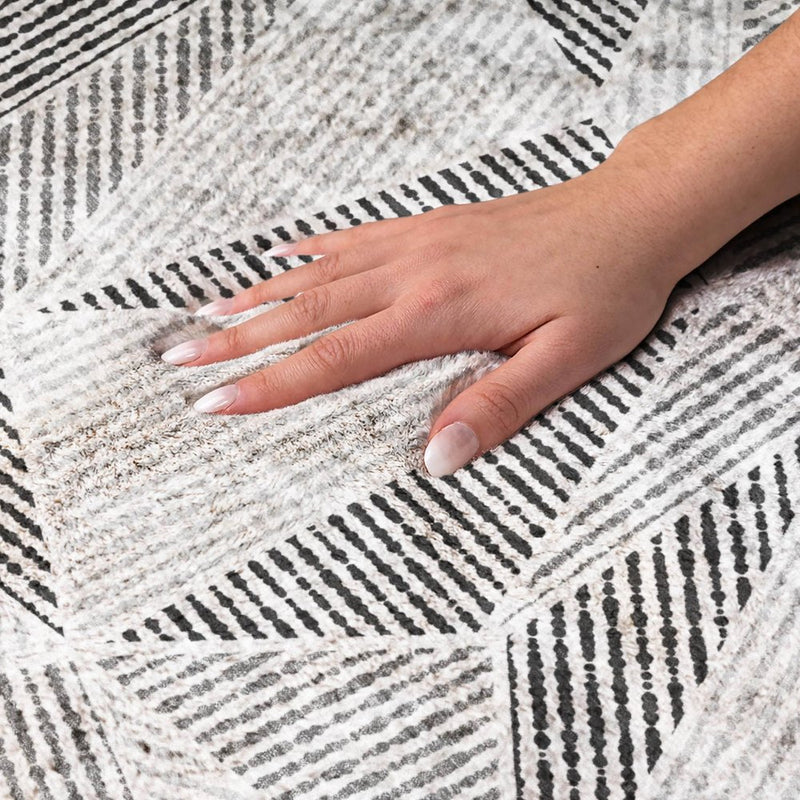 8' Pewter And Charcoal Geometric Shag Washable Round Rug With UV Protection