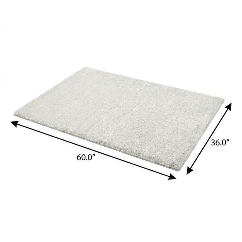 3' X 5' Beige And Tan Abstract Shag Washable Area Rug With UV Protection